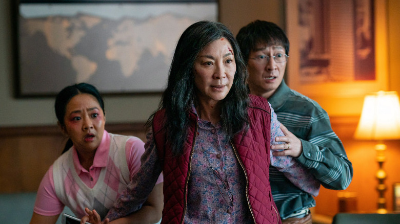 Stephanie Hsu, Michelle Yeoh, and Ke Huy Quan in Everything Everywhere All at Once