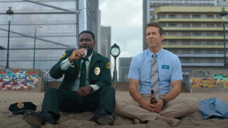 Ryan Reynolds and Lil Rel Howery in "Free Guy"