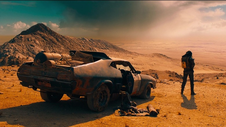 Max and his car in desert