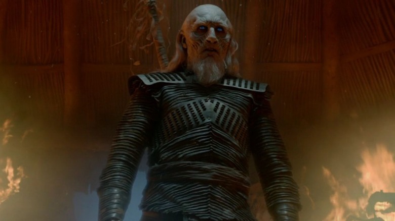 White Walker standing in fire