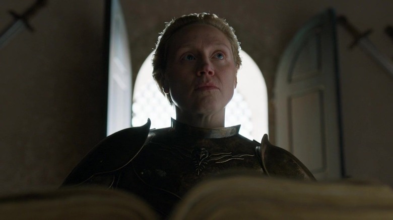 Brienne writing in book