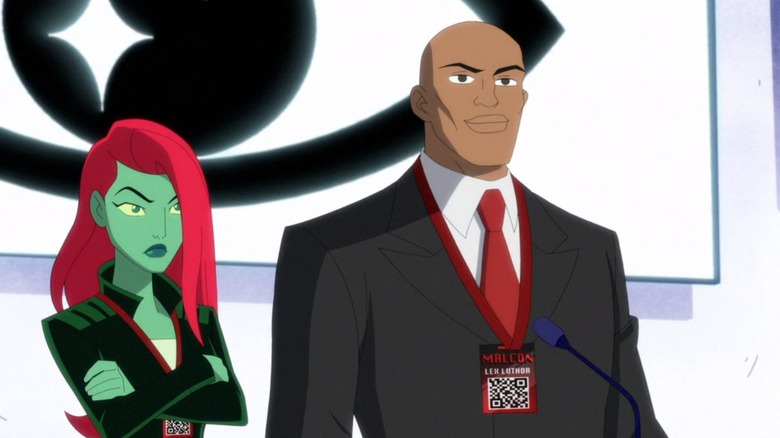 Poison Ivy and Lex Luthor standing at podium