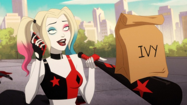 Harley Quinn holding paper lunch bag