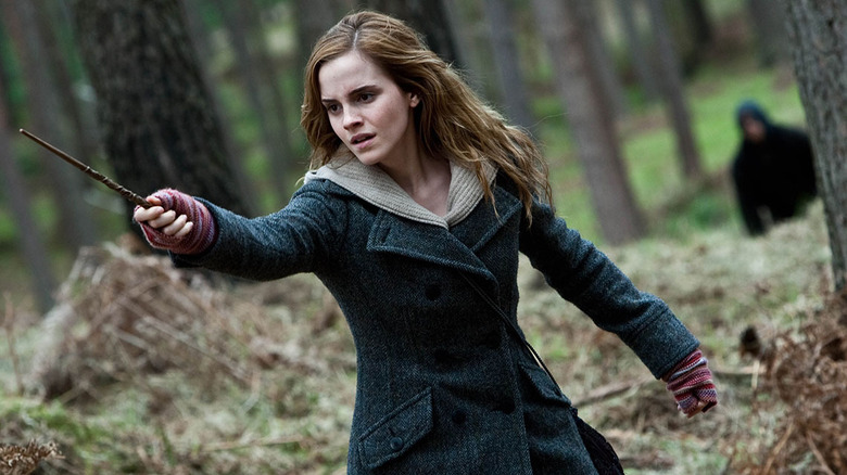 Hermione brandishing wand