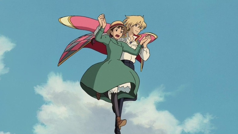 Howl helping Sophie fly