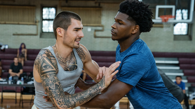 Juancho Hernangomez as Bo Cruz and Anthony Edwards as Kermet Wilts in Hustle