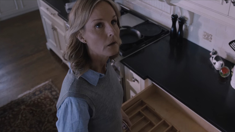 Jackie in kitchen looking up