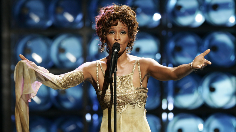 Whitney Houston performing on-stage