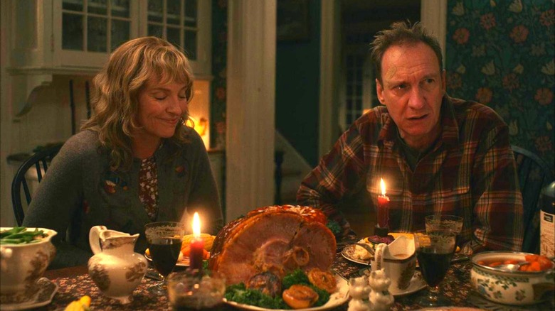 Jake's mother and father sitting at dinner table in "I'm Thinking of Ending Things"