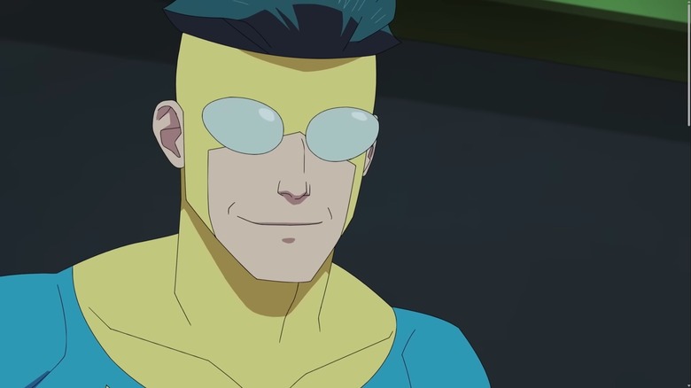 Invincible smiling wearing costume