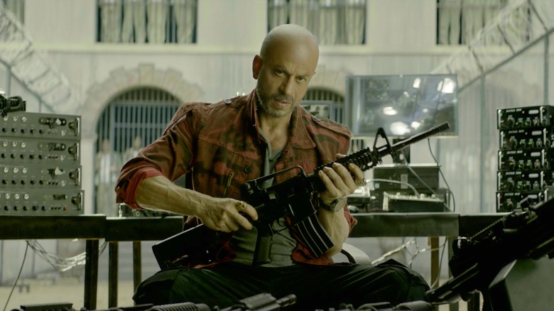 Azad Rathore holding rifle 