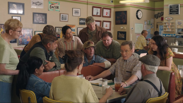 Jerry talking group in diner