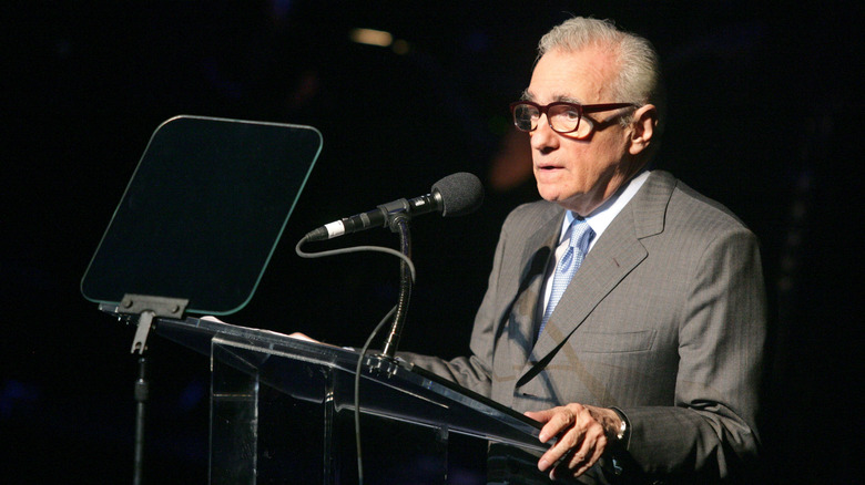 Scorsese at a microphone