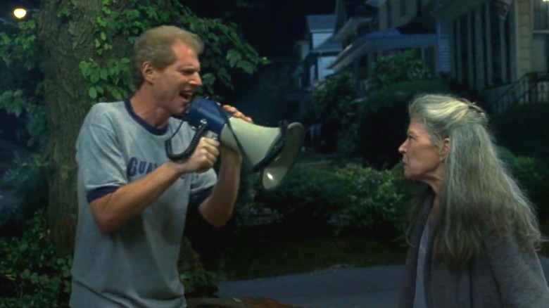 Larry shouts at Ronnie's mother with megaphone