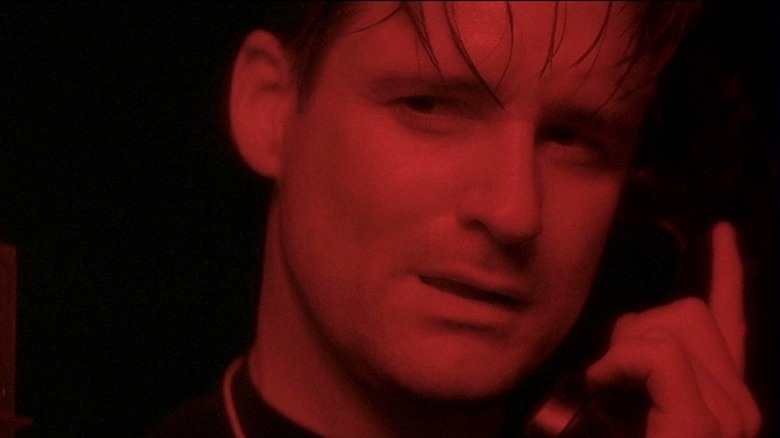 Fred Madison talks on the phone in Lost Highway (1997)