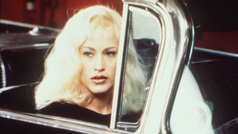 Alice sits in a car in Lost Highway (1997)