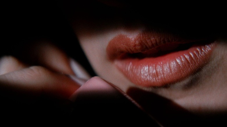 Alice speaks into the phone in Lost Highway (1997)