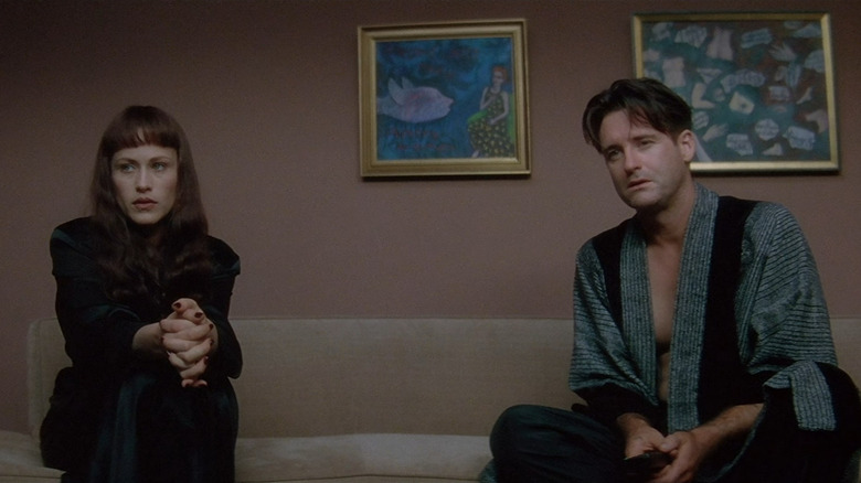 Fred and Renee watch a video of their house in Lost Highway (1997)