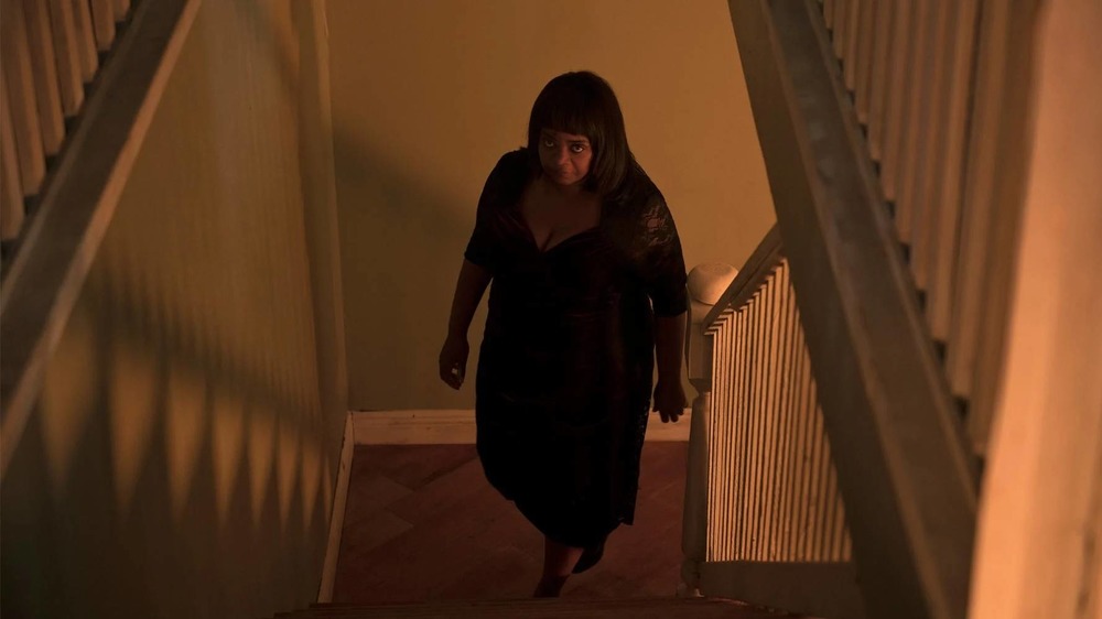 Ma walking up the stairs