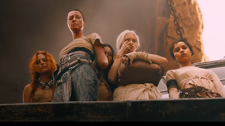 Furiosa and the wives looking downward