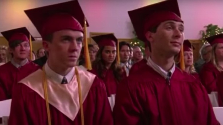 Reese and Malcolm at graduation ceremony