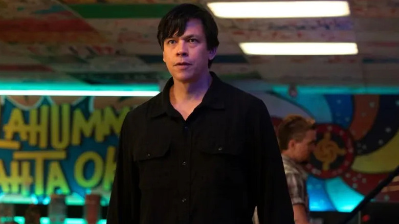 Henry standing in the roller-rink