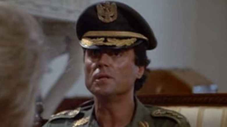 Ian McShane wears military dress