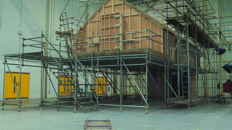 A house being built on a soundstage