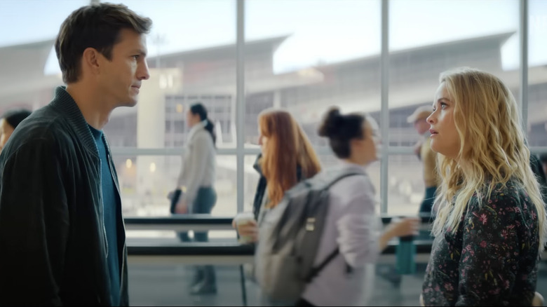 Peter and Debbie talking in the airport