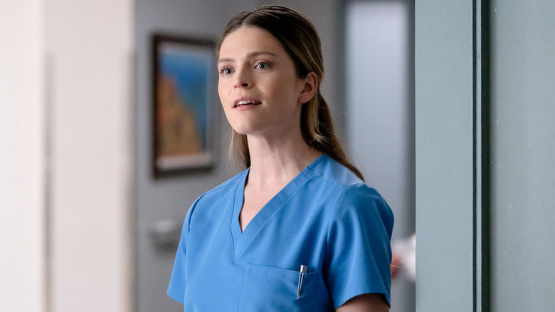 Luna Goodwin in surgical scrubs