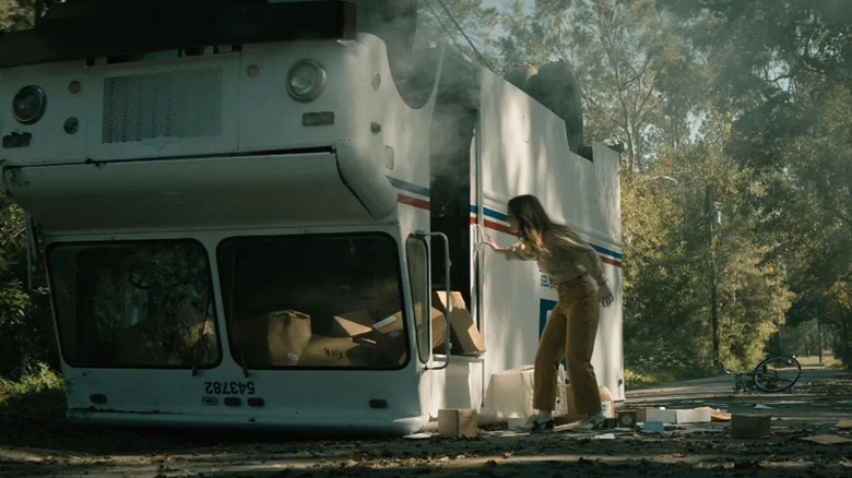 Brynn investigating damaged mail truck