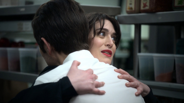 Lizzy Caplan and Adam Scott hugging