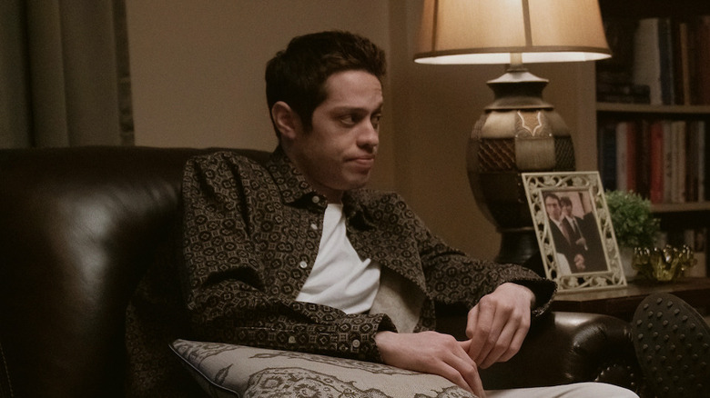 Pete Davidson sitting on couch