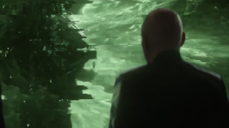 Patrick Stewart looks at a Borg ship as Jean Luc Picard in Picard