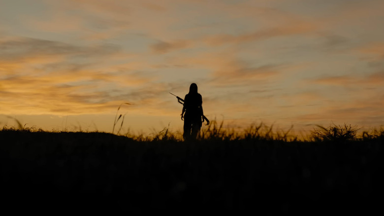 Naru walking into the sunset