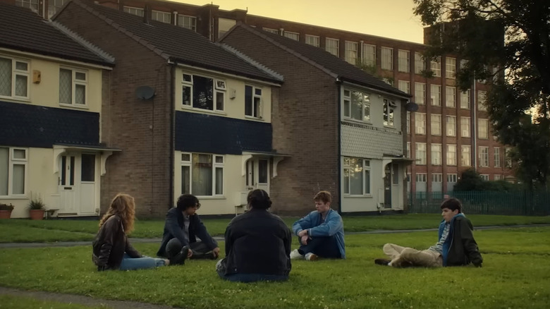 Red Rose kids sitting on grass