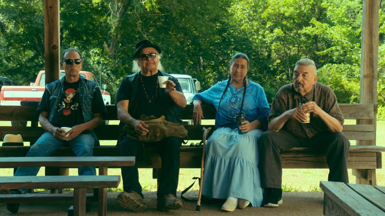 Brownie, Irene, Bucky, and Maximus sitting on bench