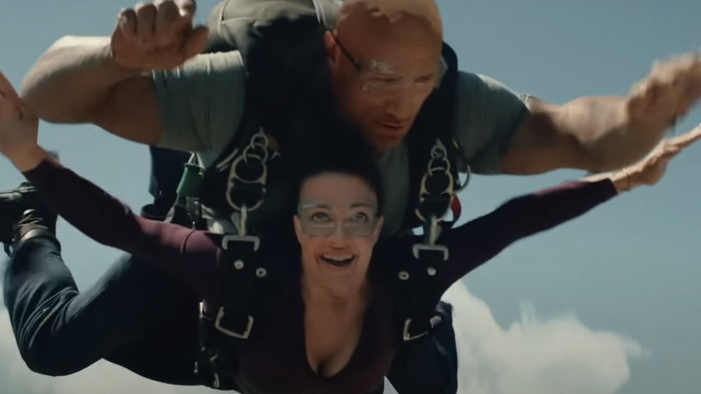 Dwayne Johnson and Carla Gugino skydiving