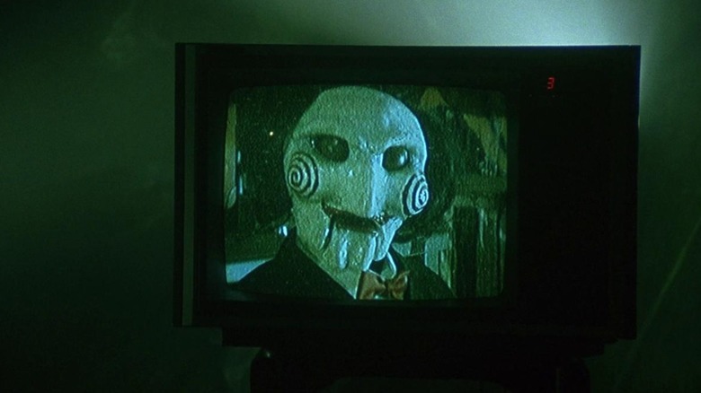 Jigsaw puppet on TV