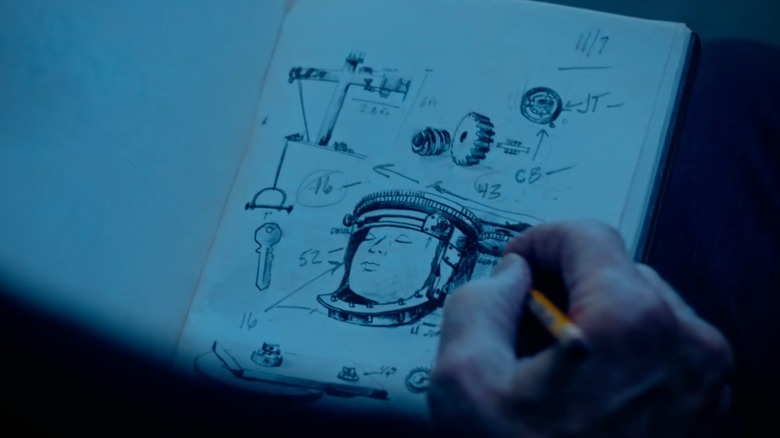 John drawing The Rack from Saw 3