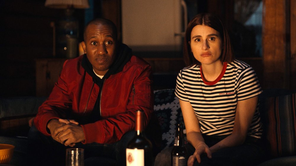 Chris Redd and Aya Cash in Scare Me