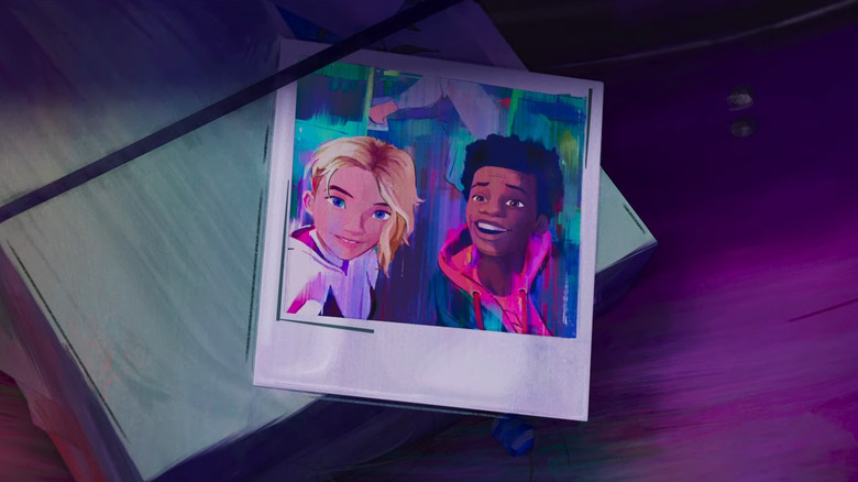 Gwen and Miles smile in a picture