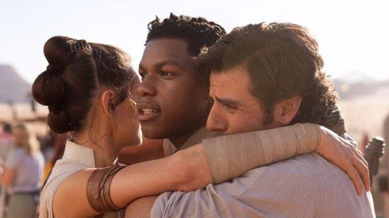 Rey, Finn, and Poe hug at the end of "Star Wars: The Rise of Skywalker"