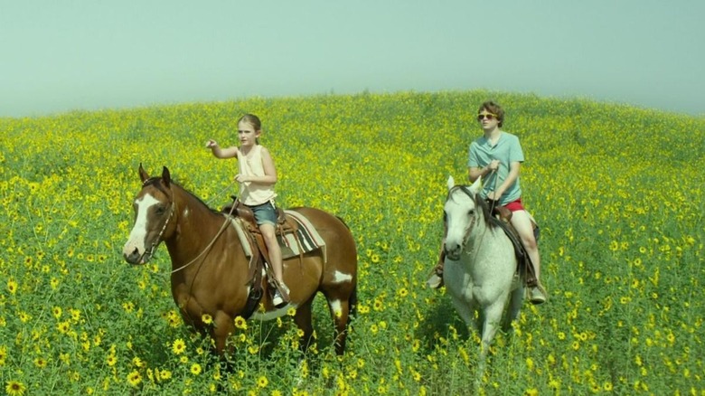 Molly and Ryder riding horses