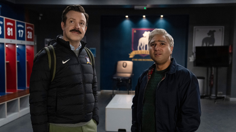 Ted and Nate smiling in locker room