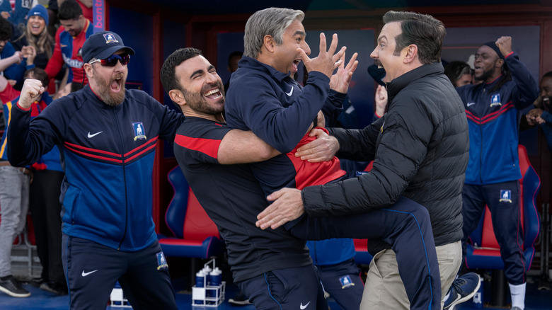 Beard, Roy, Nick, and Ted celebrating