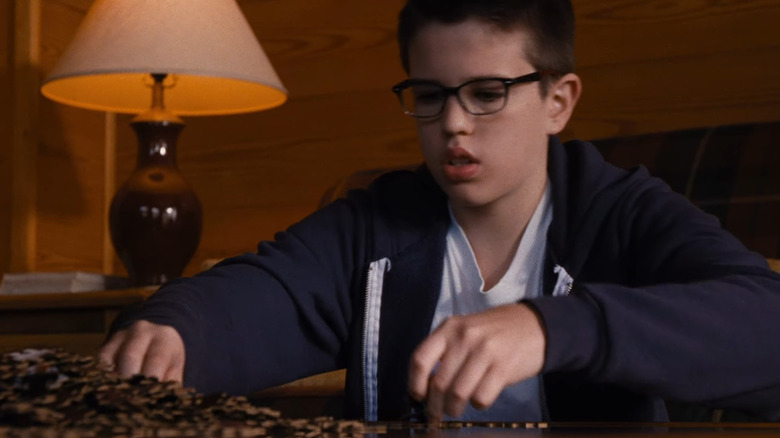 Young Chris doing puzzle