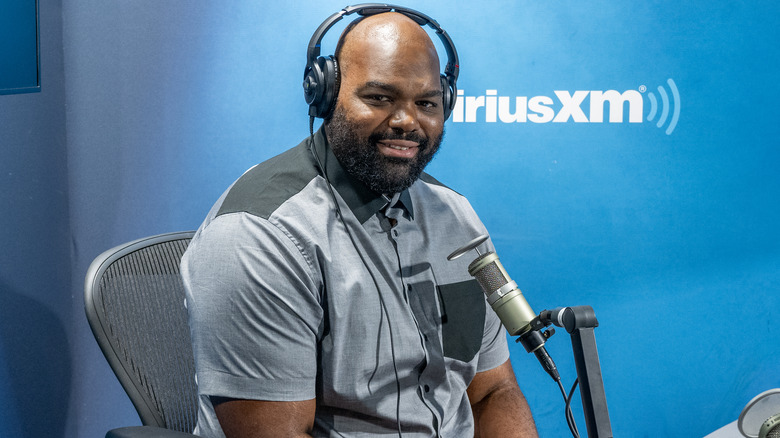 Michael Oher appearing on a podcast