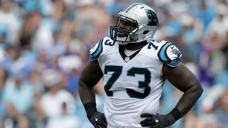 Oher on field with Panthers