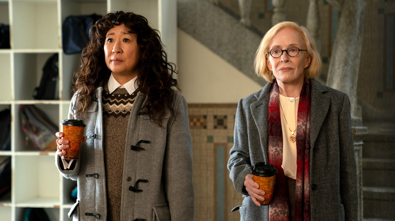 Ji-Yoon and Joan holding coffee